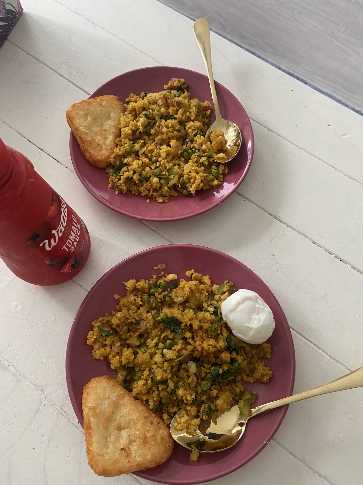 Poha breakfast plates with hash brown and poached egg